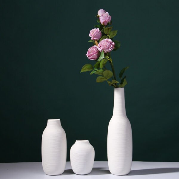 3 styles of white ceramic flower vases