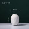 Minimalist white ceramic vase for office desk