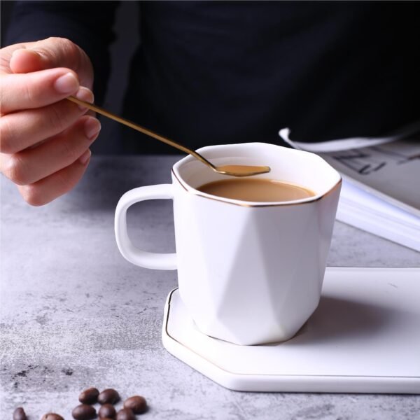 Wholesale geometric gilded ceramic mug with saucer.