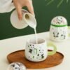 wholesale High-quality panda ceramic mug with lid for water and coffee.