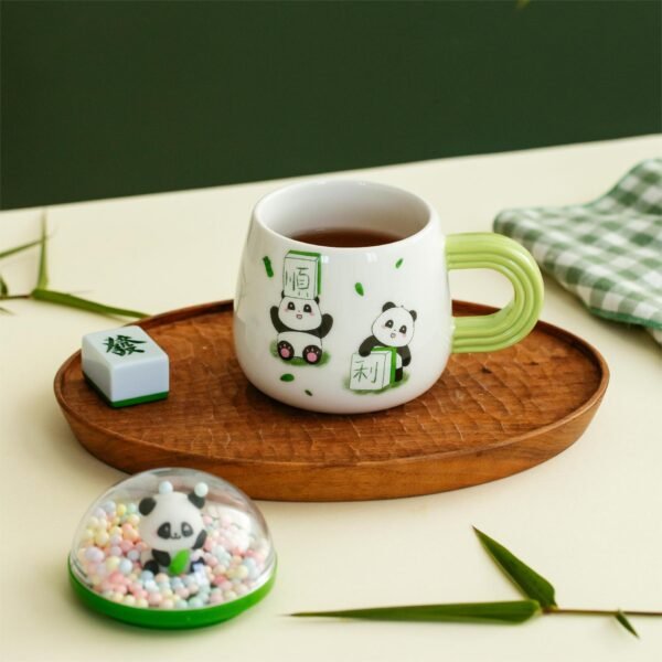 Ceramic panda mug with lid, perfect for students and professionals.
