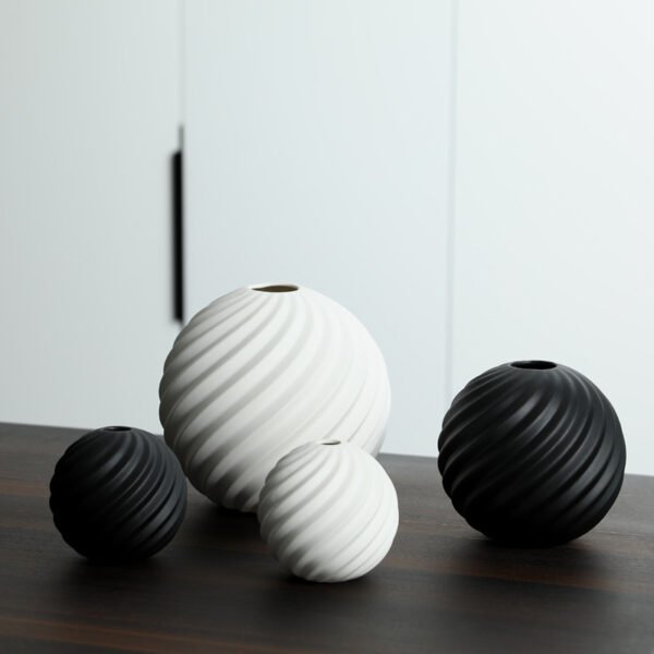 Wabi-Sabi black and white round ceramic vase for living room décor, wholesale supply.