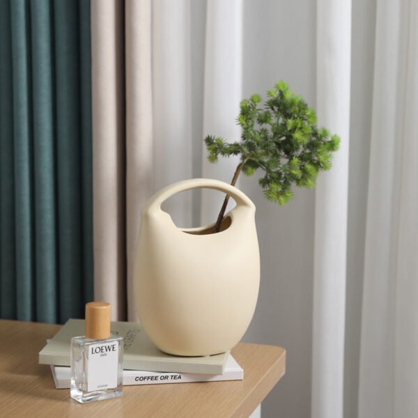 Wholesale minimalist ceramic bag vase for living room and TV cabinet décor.