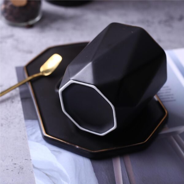 Creative geometric ceramic mug with saucer, perfect for office.