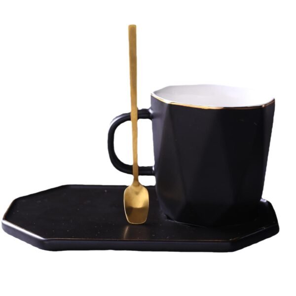 Minimalist black and white geometric ceramic tea set.