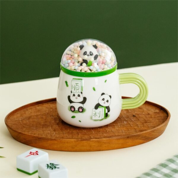 Panda-themed ceramic coffee mug with lid, perfect for office or home.
