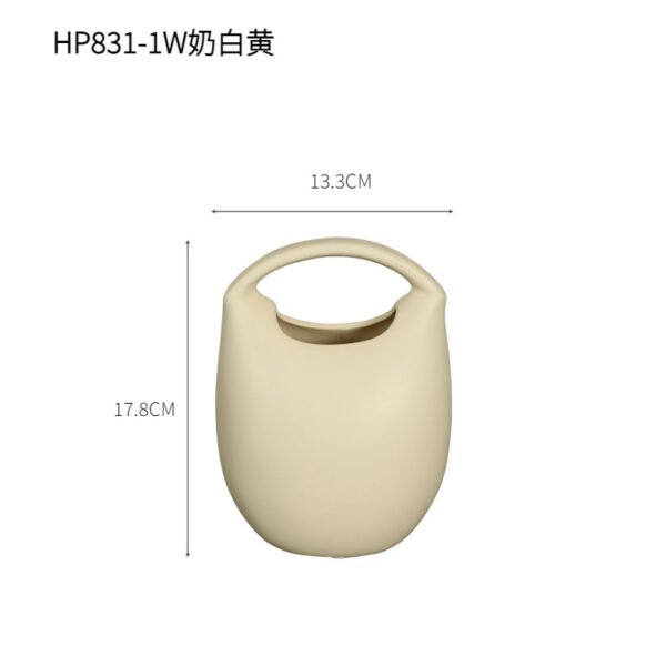 Creative ceramic bag vase for dining table floral arrangements, wholesale supply.