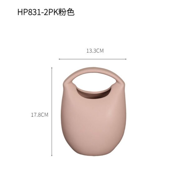 Wholesale ceramic bag vases for stylish living room décor and floral arrangements.