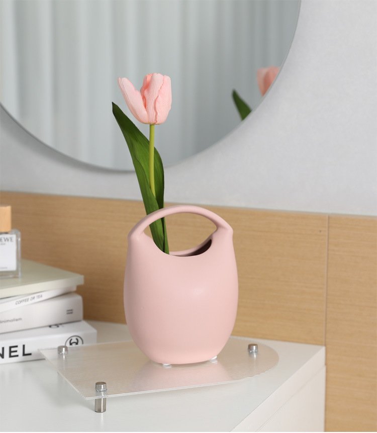 Wholesale creative ceramic bag vase for dining table decoration and home décor.