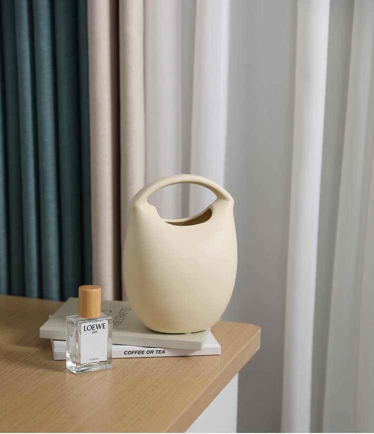 Wholesale ceramic bag vase for modern home décor, minimalist design.