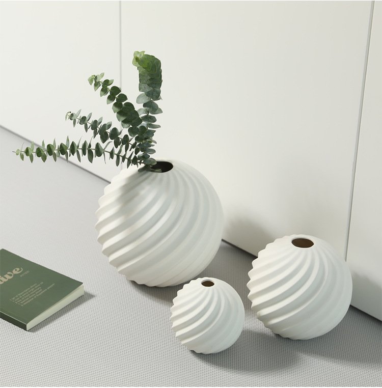 Black and white ceramic vase for modern home décor.
