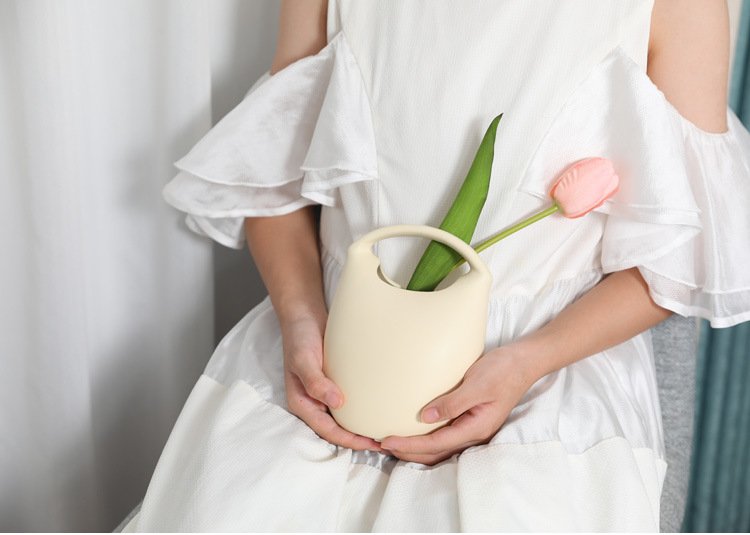 Nordic-inspired ceramic bag vase for wholesale orders, perfect for modern home décor.