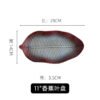 Wholesale Japanese ceramic leaf-shaped plate with artistic relief design