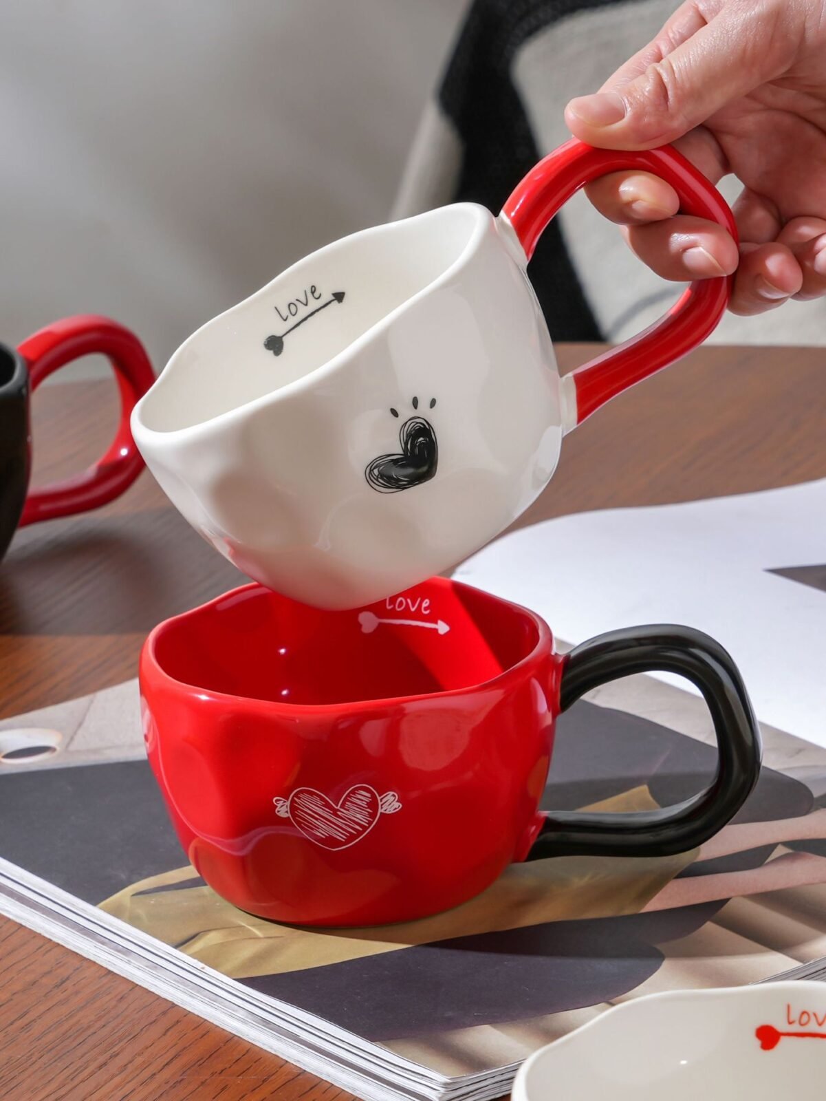 Simple ceramic cup with a heart handle