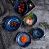 Minimalist ceramic bowl with reactive glaze, perfect for modern dining