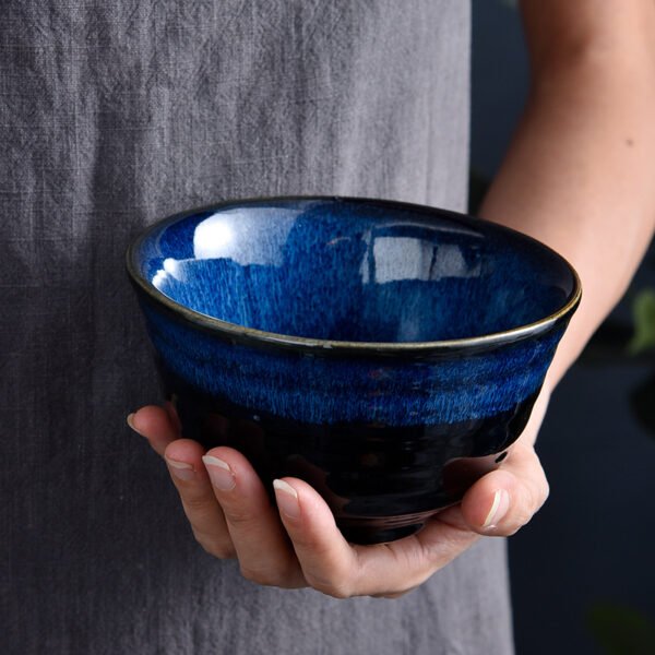 Small ceramic dipping dish with reactive glaze for sauces
