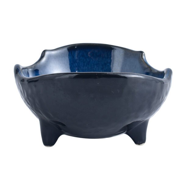 Unique ceramic rice bowl with a rustic reactive glaze
